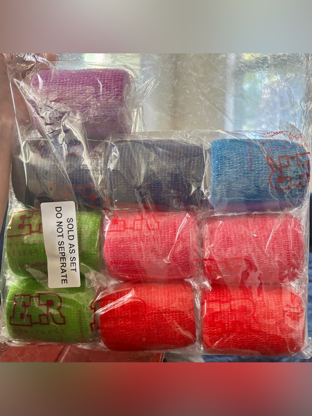 Self-adhesive wrap, 10 individual packages of 3” wraps, colorful, unopened